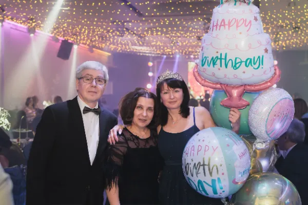 Birthday girl tiara older couple birthday balloons