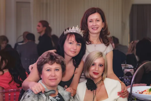 Four women birthday girl tiara group
