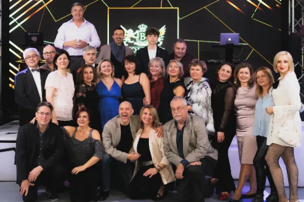 Large group photo on stage
