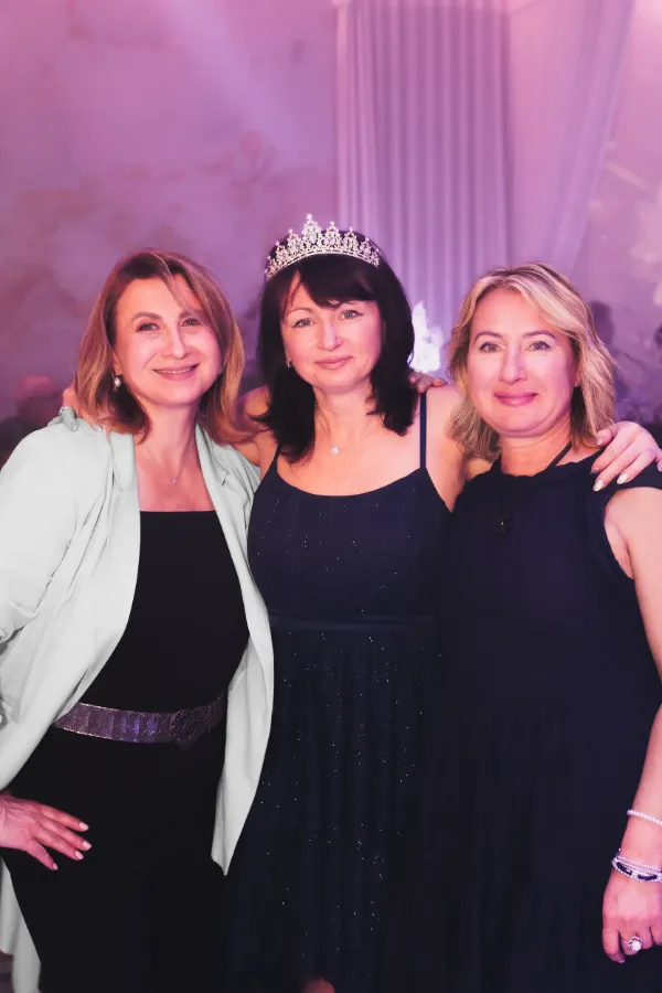 Three women birthday girl tiara dancefloor