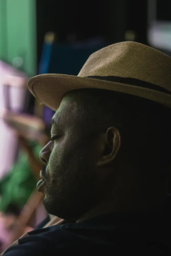Bts mv crew member straw fedora eyes closed side profile green light